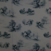 White or cream wallpaper with scattered images of country cottages, stone bridges, and a lake with a sail boat.