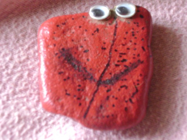 Red Pet Rock with google eyes