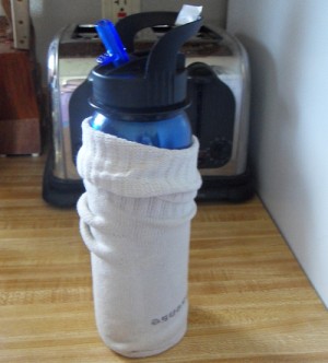 Picture of a sock as a bottle cozy.