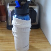 Picture of a sock as a bottle cozy.