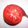 Peeling tomato with spoon