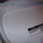 Picture of crayon stains on a dryer door.