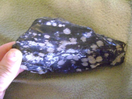 white spotted, black shiney rock