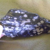 white spotted, black shiney rock