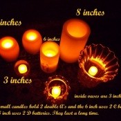 Group of Seven Various Orange Flameless Candles