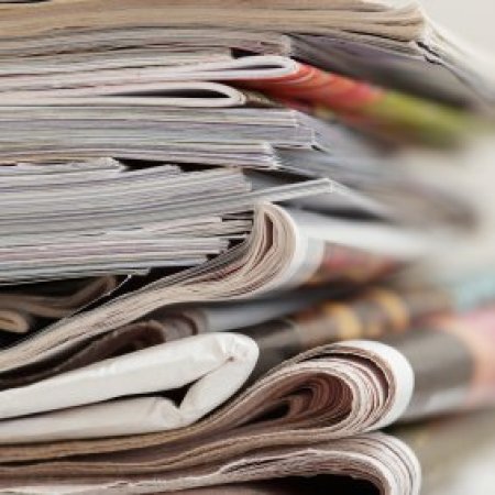 Stack of magazines and newspapers.