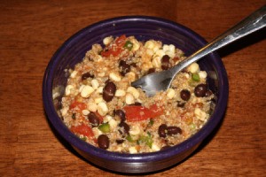 A quinoa salad with black beans, corn, tomatoes and other spices.