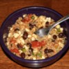 A quinoa salad with black beans, corn, tomatoes and other spices.