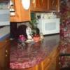 Before and after photos of a painted countertop.