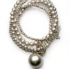 Coiled silver bead necklace with large silver ball.