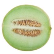 Honeydew melon sliced in half, stem to blossom end.