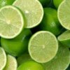 Whole limes and limes cut in half.