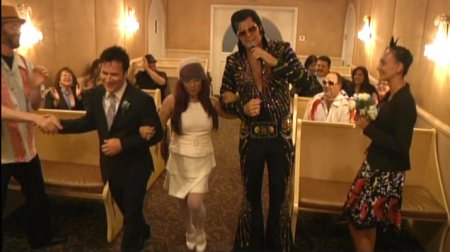 Elvis Impersonator Walking Bride and Groom Down Aisle