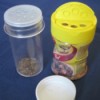 Recycled spice jars for storing garden seeds.