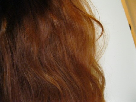 Long red hair on back of head