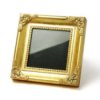 Gold picture frame.