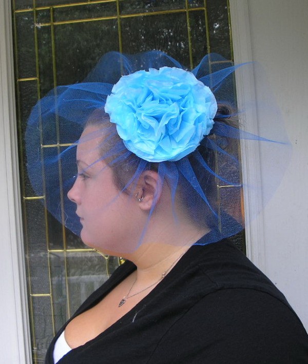 Woman wearing a handmade Fascinator