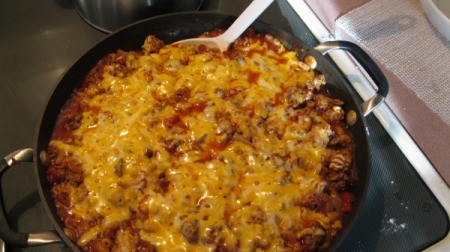 A skillet supper with hamburger, cheese and macaroni.