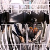 Interior of a full dishwasher.