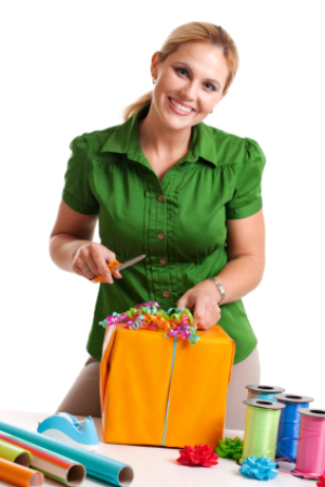 Wrapping a Present, Woman in Green Wrapping a Present