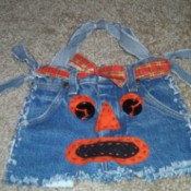 Finished Halloween jean bag, complete with face and belt.