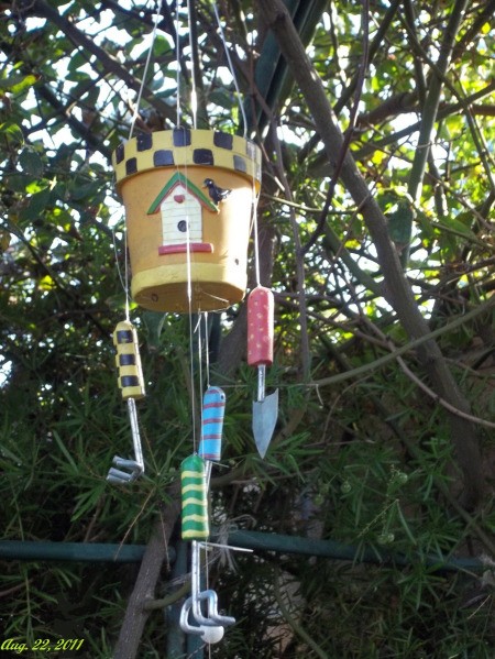 Painted Planter Windchime Hanging in Tree