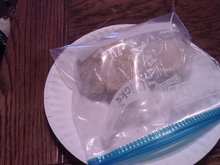 A bag of crustless sandwiches for the freezer.