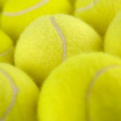 A pile of yellow tennis balls.