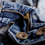 A zipper on a pair of jeans.