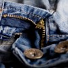 A zipper on a pair of jeans.
