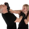 Woman Learning self Defense Against Male Attacker