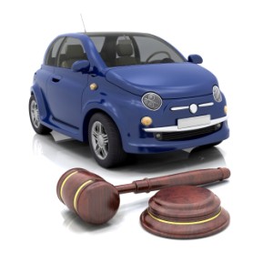 Buying a Car at Auction, Car for Auction With Gavel in Foreground