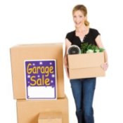 Woman holding a box for a garage sale