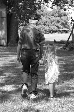 Girl Holding Hand and Walking with Great-Great Grand Father