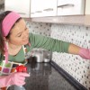 Woman Cleaning Her Kitchen