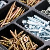 Screws stored in a compartment tray.