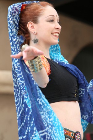 Smiling Woman in Belly Dance Costume