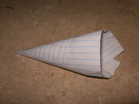 Funnel made from notebook paper.