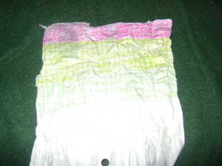 Sheet of paper colored pink and green.