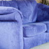 Blue Suede Couch in Carpeted  Living Room