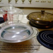 Glass lids on top of measuring cup and other bowls.