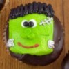 Cupcake with a Frankenstein decoration on top.