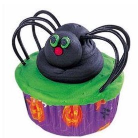 Black spider cupcake with colorful frosting.