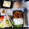 Eating Healthy While You Travel, A tray of prepackaged airline food.