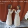 Two Praying Statues