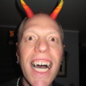 man with Devil horns and fangs
