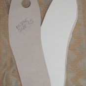 Cardboard shoe sole template.