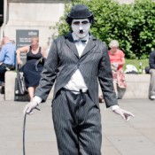 Man on the Street in Charlie Chaplin Costume