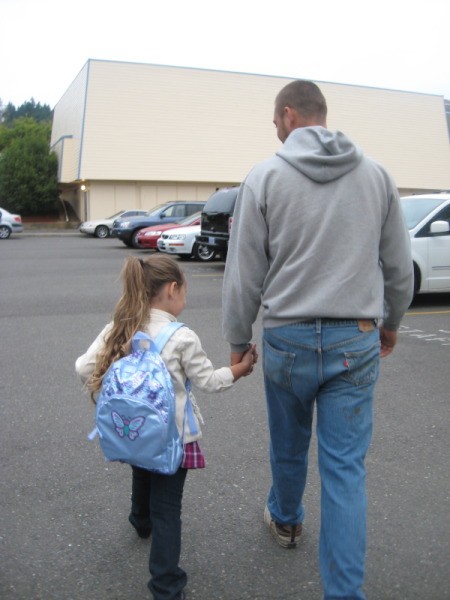 Father and Daughter off to the First Day of School