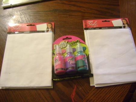 Package of puffy paint and two packages of white bandanas.